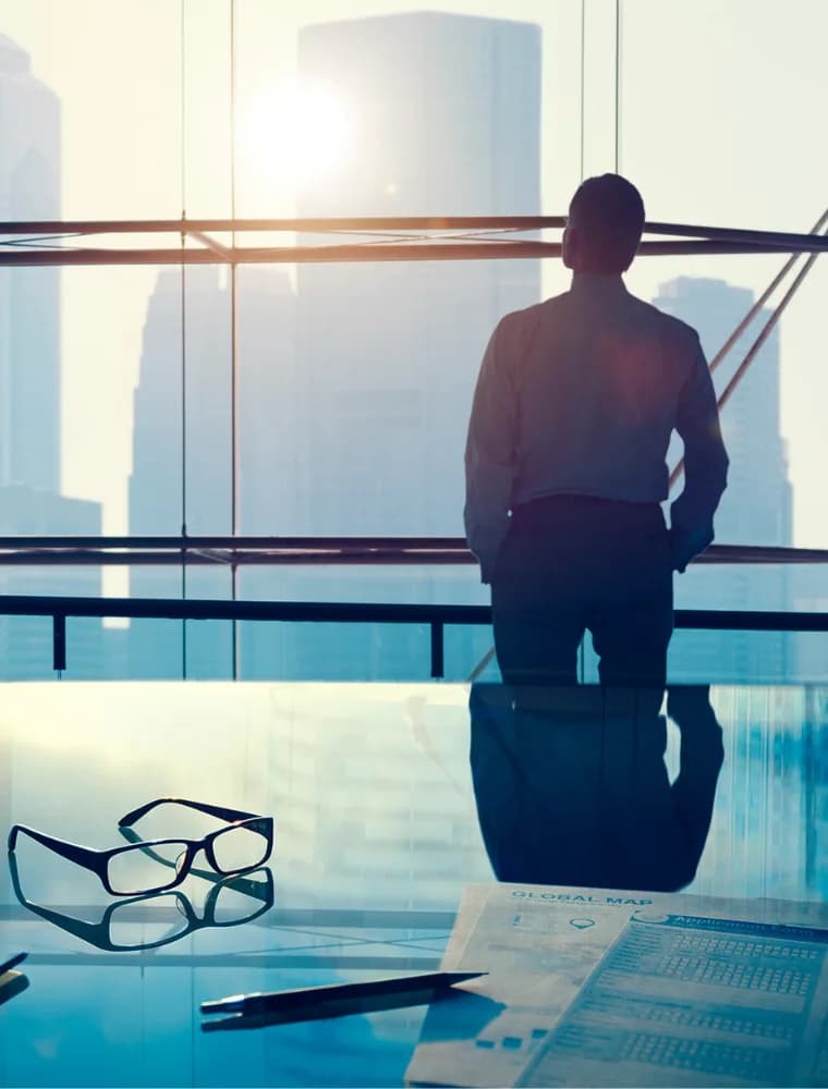 A panoramic view of a thriving African city skyline mixed with natural landscapes, symbolizing growth and sustainability